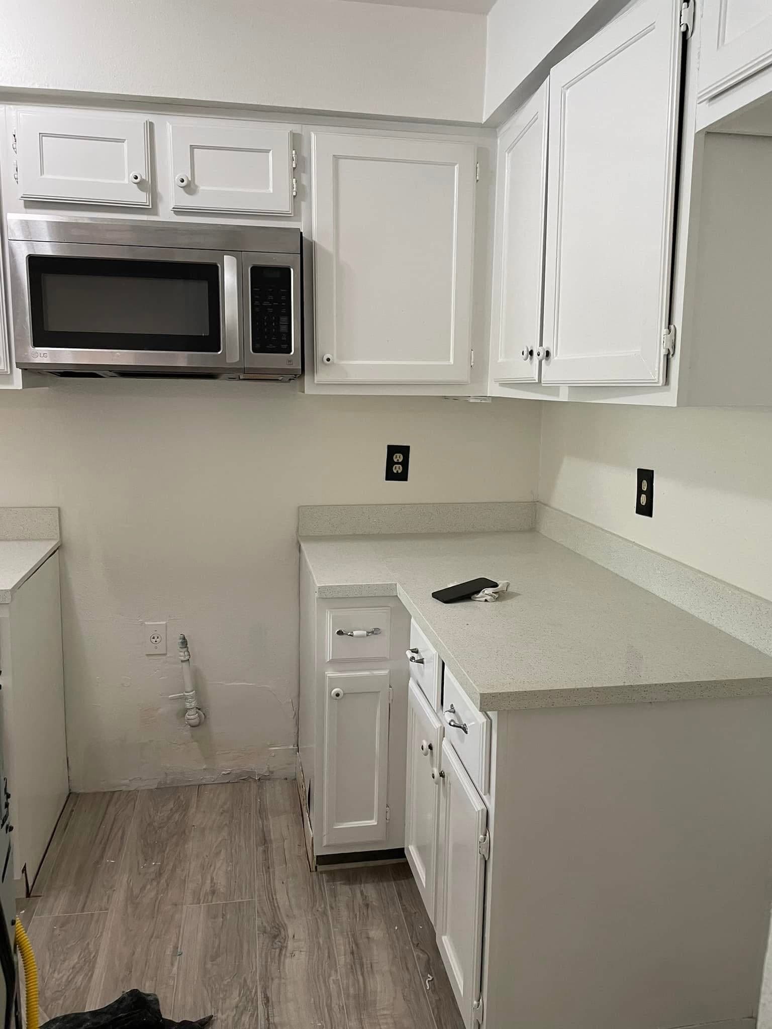 White kitchen under installation