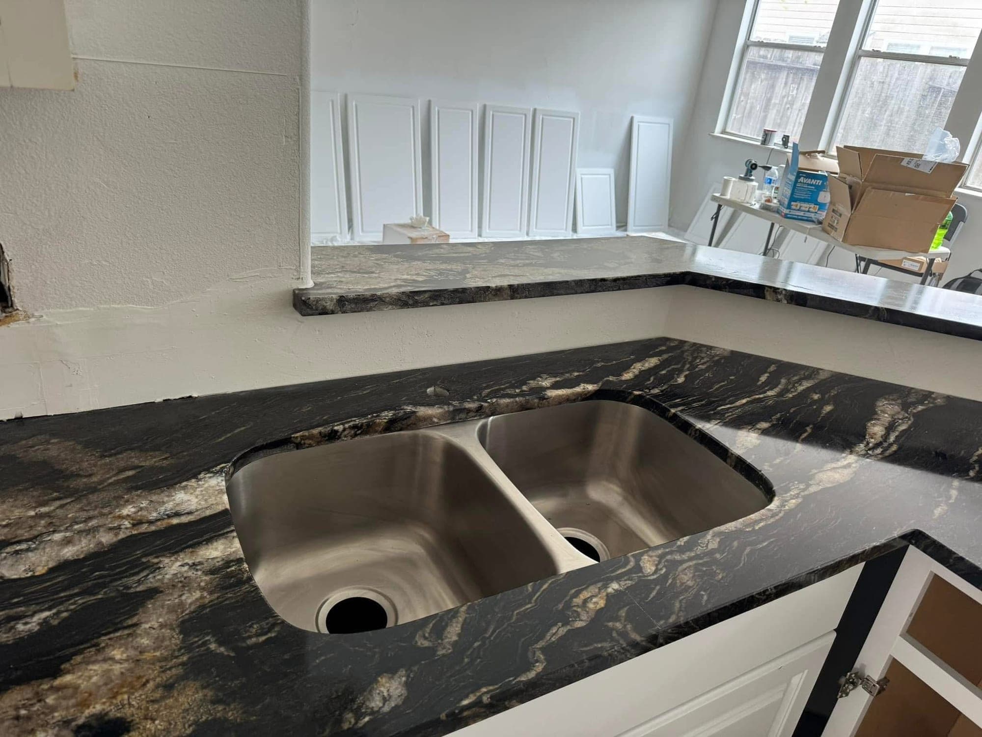 Kitchen with dark quartz countertop — 2
