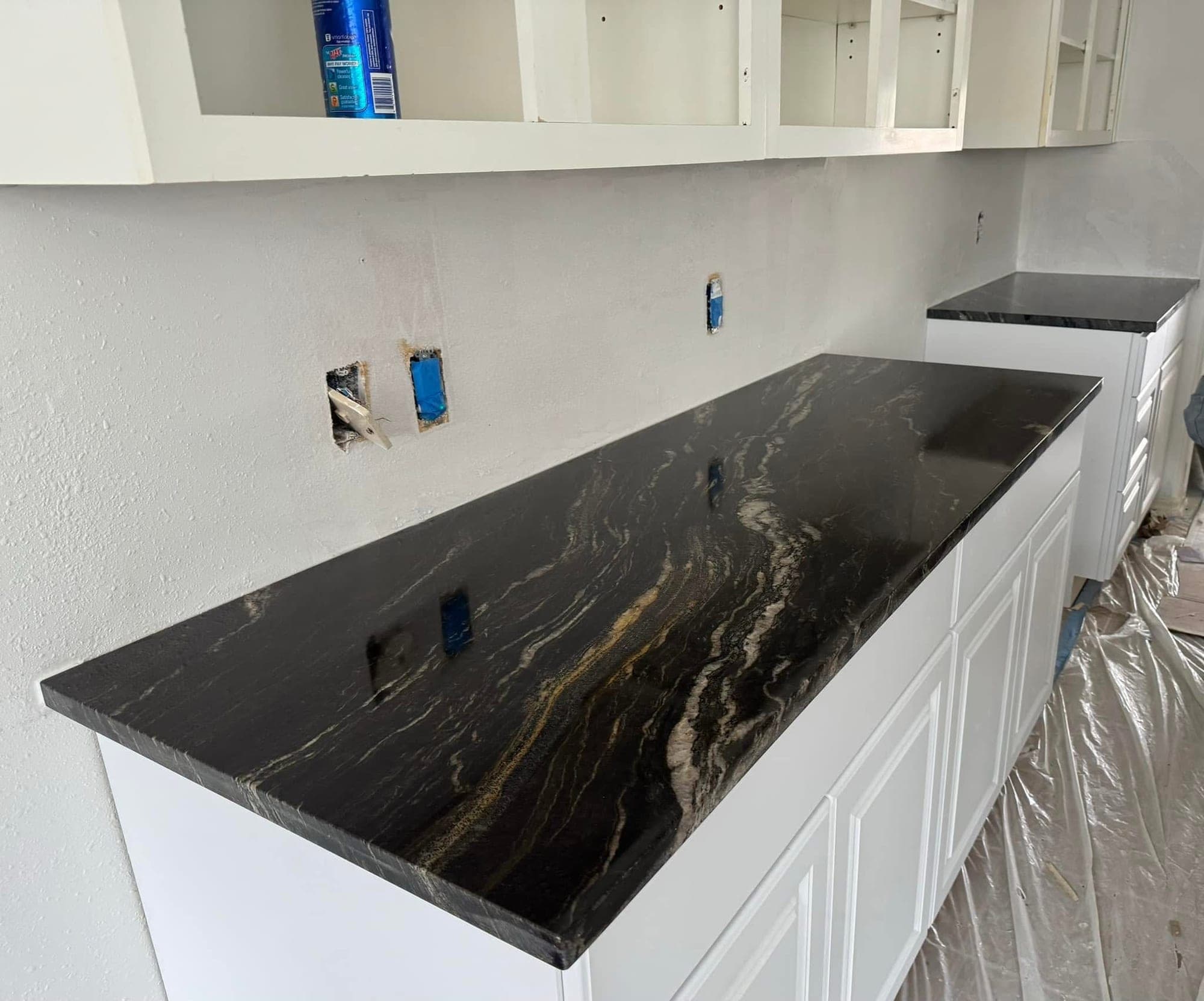 Kitchen with dark quartz countertop — 3