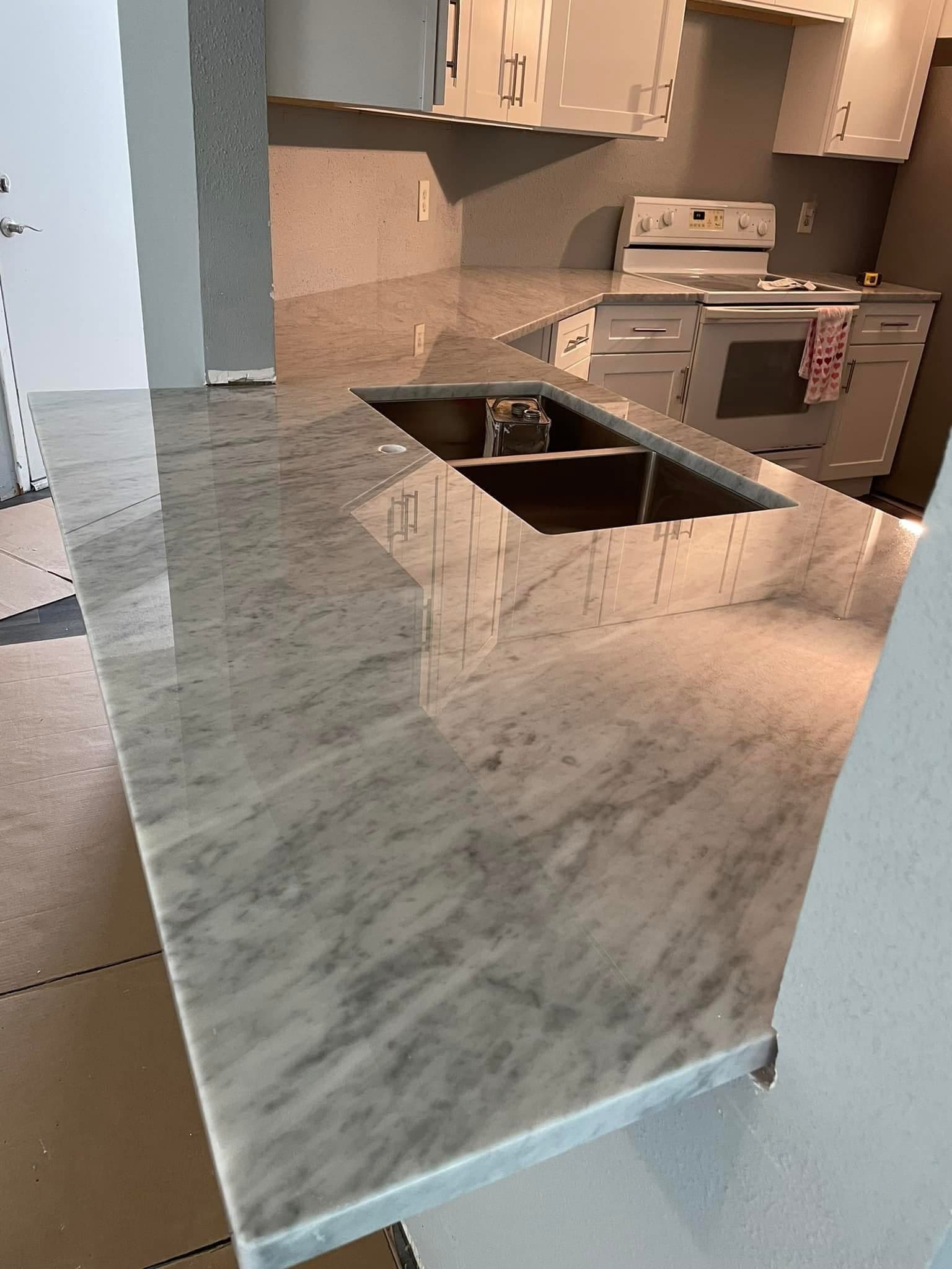 Kitchen with gray mosaic backsplash