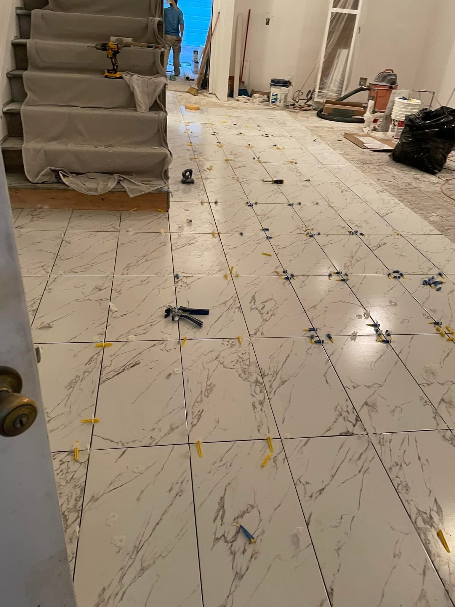 Marble-look flooring from the staircase to the kitchen — 3